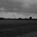 Majdanek - táborové baráky a strážní věže